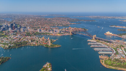 Fototapeta premium Aerial View of Sydney Harbour Balmain Darling harbour Sydney CBD cockle Bay Wharf North Sydney harbour bridge Lavender Bay Milsons Point Manly on a warm summer day blue skies 