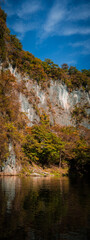 Geibikei gorge valley Japan, travel destinations in autumn or fall season, color of leaf in yellow, orange and green. Nature and mountain attraction view. floating activity. Japan sightseeing.