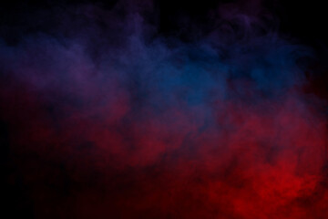 Fototapeta premium Orange and red steam on a black background.
