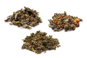 Dry tea leaves and dry fruit isolated on white background.