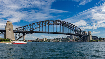 Sydney, New South Wales, Australia: View of Sydney Harbour Bridge and a ferry boat