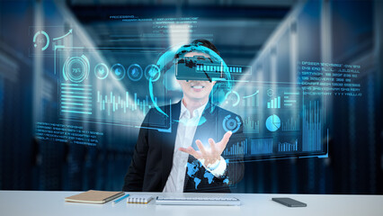 Smart project manager looking and holding business data and checking financial chart. Smart business man wearing augmented reality goggles by using artificial intelligence planning plan. Ingenuity.