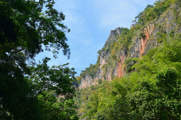 Red Cliffs and Lush Green Forest in Umphang Wildlife Sanctuary in Tak Province