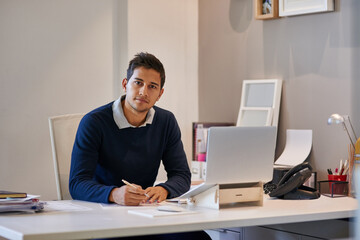 Office, businessman and portrait with laptop for research, filling document and project for administration. Career, male person and secretary with paperwork for corporate report, proposal and pride