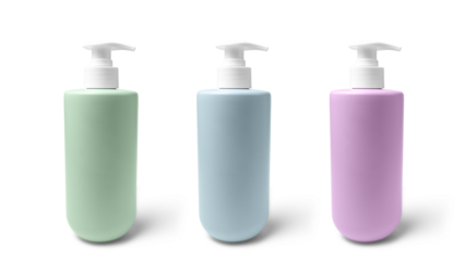 Green, blue and purple unbranded bottles with pump for liquid soap, shampoo, or lotion isolated on a white background
