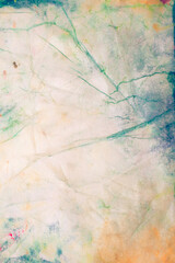 Abstract background with watercolor paints with different colors, on crumpled wet paper. Drawing with unusual patterns for your creative work or design.