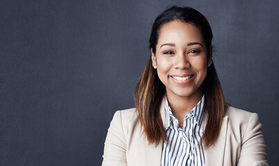 Fototapeta premium Studio, businesswoman and smile in portrait for law firm, justice mission and happiness with pride. Mockup space, female person and lawyer with confidence for court case, project and dark background