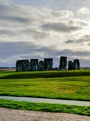 Historical Stone Formation in a Green Landscape During a Cloudy Day in England