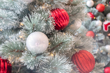 Red Christmas ball Decorated on Christmas tree in living room,Festive image in holiday,Merry Christmas and Happy New Year.