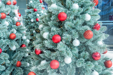 Red Christmas ball Decorated on Christmas tree in living room,Festive image in holiday,Merry Christmas and Happy New Year.