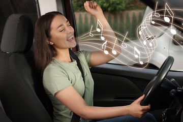 Beautiful woman singing in car. Music notes flying out of her mouth