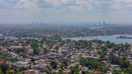 Aerial View of Sydney Harbour Balmain Darling harbour Sydney CBD cockle Bay Wharf North Sydney harbour bridge Lavender Bay Milsons Point Manly on a warm summer day blue skies 