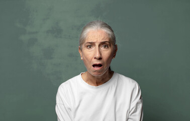  feeling terrified and shocked, with mouth wide open in surprise