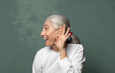  looking happy, listening, trying to hear a secret conversation or gossip, eavesdropping