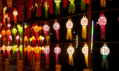 Colourful light of Sa paper hang lanterns in the night at Loi Krathong (Yi Peng) Festival, Chiang Mai, Thailand.