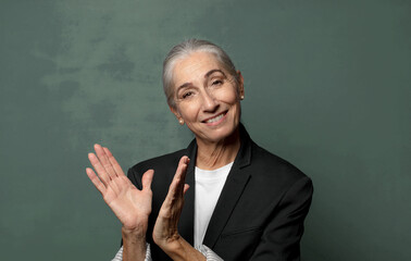  feeling happy and successful, smiling and clapping hands, saying congratulations with an applause