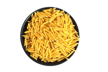 There is a black plate with dry pasta on a white background.