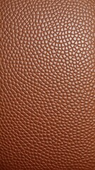 Fototapeta premium Genuine brown leather with intricate natural grain pattern, rugged, luxury