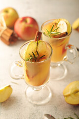 Warm apple autumn drink with cinnamon