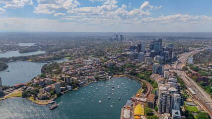 Fototapeta premium Aerial View of Sydney Harbour Balmain Darling harbour Sydney CBD cockle Bay Wharf North Sydney harbour bridge Lavender Bay Milsons Point Manly on a warm summer day blue skies 
