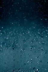 CLose Up of Condensation Bubbles and Marks on A Window Water Background