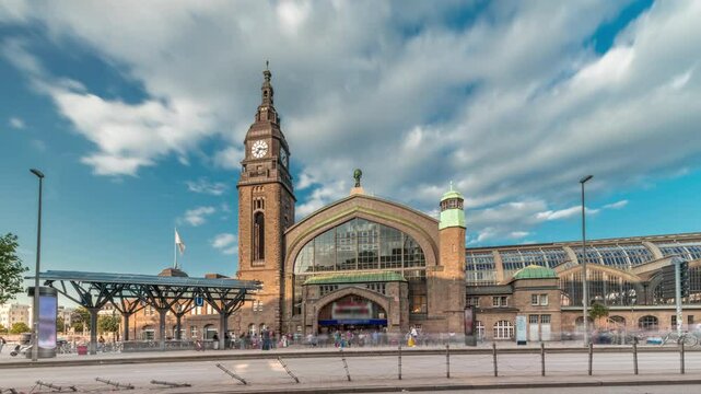 Entrance to Hamburg Hauptbahnhof timelapse hyperlapse, the main railway station, Germany. Classified as a category 1 station by Deutsche Bahn. Traffic and activity around the historic structure