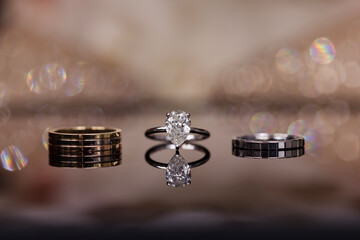 Three Wedding Rings with Reflection