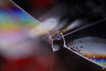Silver liquid connections, bubble in macro, movement of liquid in a bubble, abstract background,...