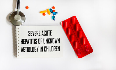 Severe acute hepatitis of unknown aetiology in children medical term with stethoscope.