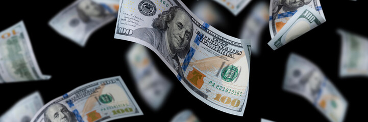 Flying dollar bills in the air. 100 new design US banknotes soaring.