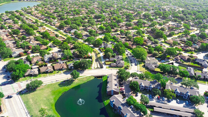 Residential concrete drainage channel at lakeside neighborhood in Coppell suburbs Dallas, Texas,...