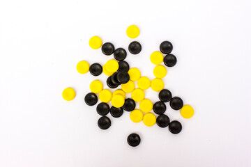 Black and yellow pieces isolated on white background.