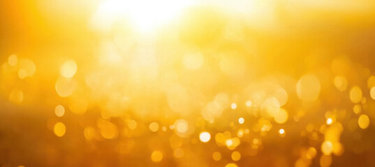 A blurred golden warm yellow and orange abstract sunny summer sky background Illustration.
