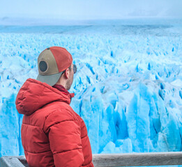 Tourists enjoying the views of the Perito Moreno Glacier, a giant glacier at the end of the world,...