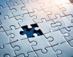 Fototapeta premium Puzzle with one missing piece being placed, representing leadership completing the bigger picture