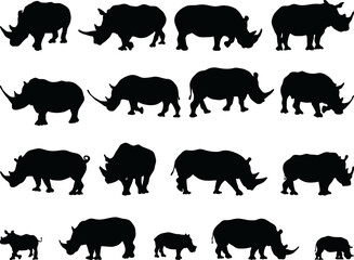 Black silhouettes of rhinos