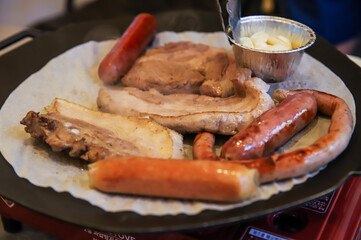 Korean barbecue. pork and sausage