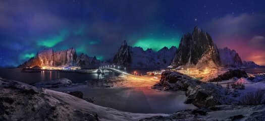 Majestic Aurora Over Snowy Night in Lofoten, Norway
