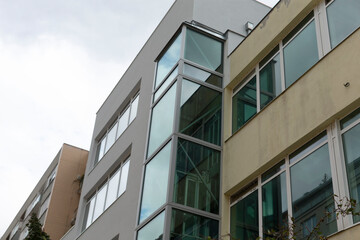 This is a structure featuring an abundance of windows integrated into its design, allowing for ample natural light to illuminate the interior