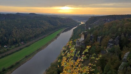 Obraz premium sunset over the river