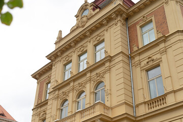A large and impressive building featuring numerous windows and balconies that add to its architectural design and character