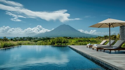 Fototapeta premium Nevis Peak Volcano View from Christopher Harbour. Blue Sky, Sea, and Nature Landscape