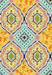 Seamless ethnic pattern of paisley and decorative floral branches. Indian motif.