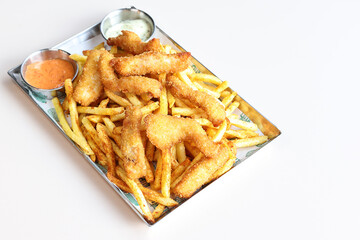 French fries, beer plates, onion rings, sausage, ketchup, may onees