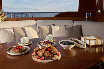 Indulge in a Gourmet Breakfast on a Luxurious Yacht with a Beautiful Scenic Ocean View