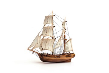 Naklejka premium an isolated of a toy sailing ship on white background with high contrast shadow