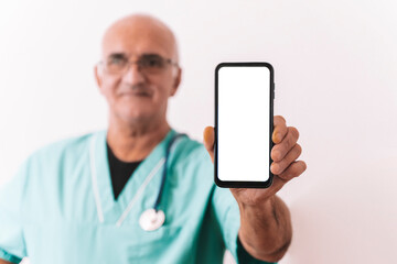 Doctor holding phone. Doctor with empty blank phone on white background. 