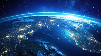 Obraz premium Stunning view of Earth at night, showcasing illuminated cities and starry skies in a breathtaking blue hue.