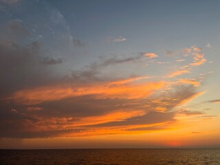 the sea wave rolls over the colorful pebbles on the Black Sea coast