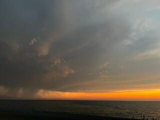 Obraz premium the sea wave rolls over the colorful pebbles on the Black Sea coast